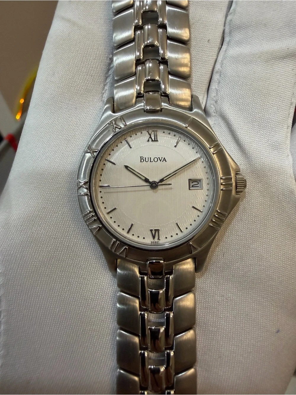 Bulova 96B21 Stainless Steel White Pinstripe Dial Roman Bezel Quartz Watch T9